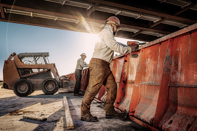 Two man working outdoor with sun-safe work clothing