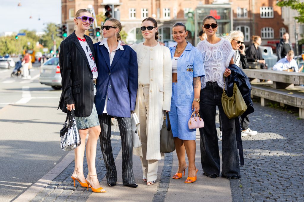 five ladies wearing sunglasses