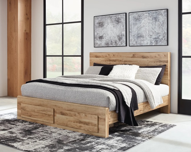 a wooden bed that is queen sized