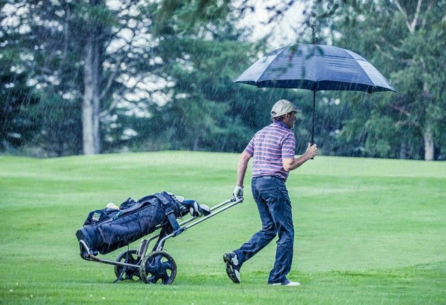 person wearing pants in the rain